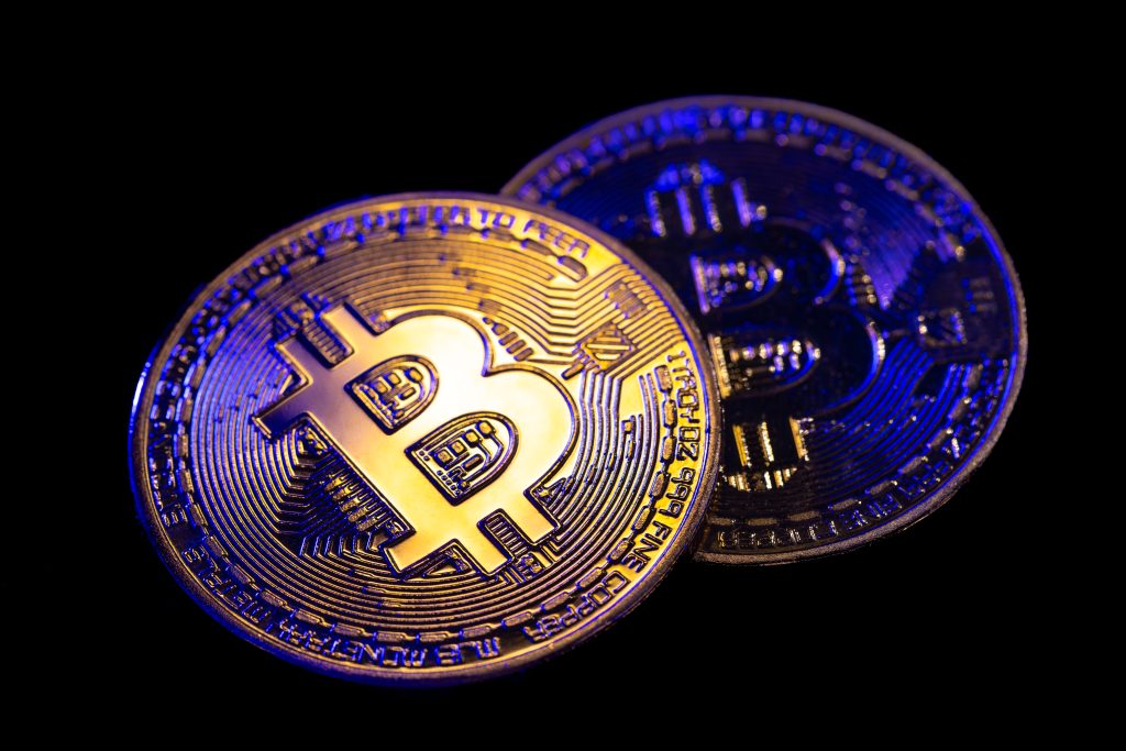 Bitcoin coin black background.